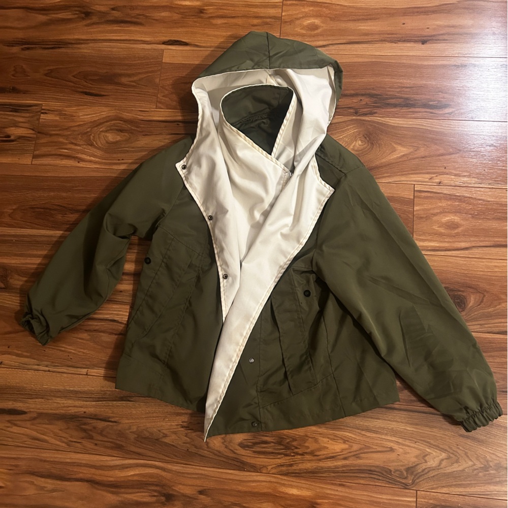Green and Cream Hooded Raincoat for Outdoor Adventures